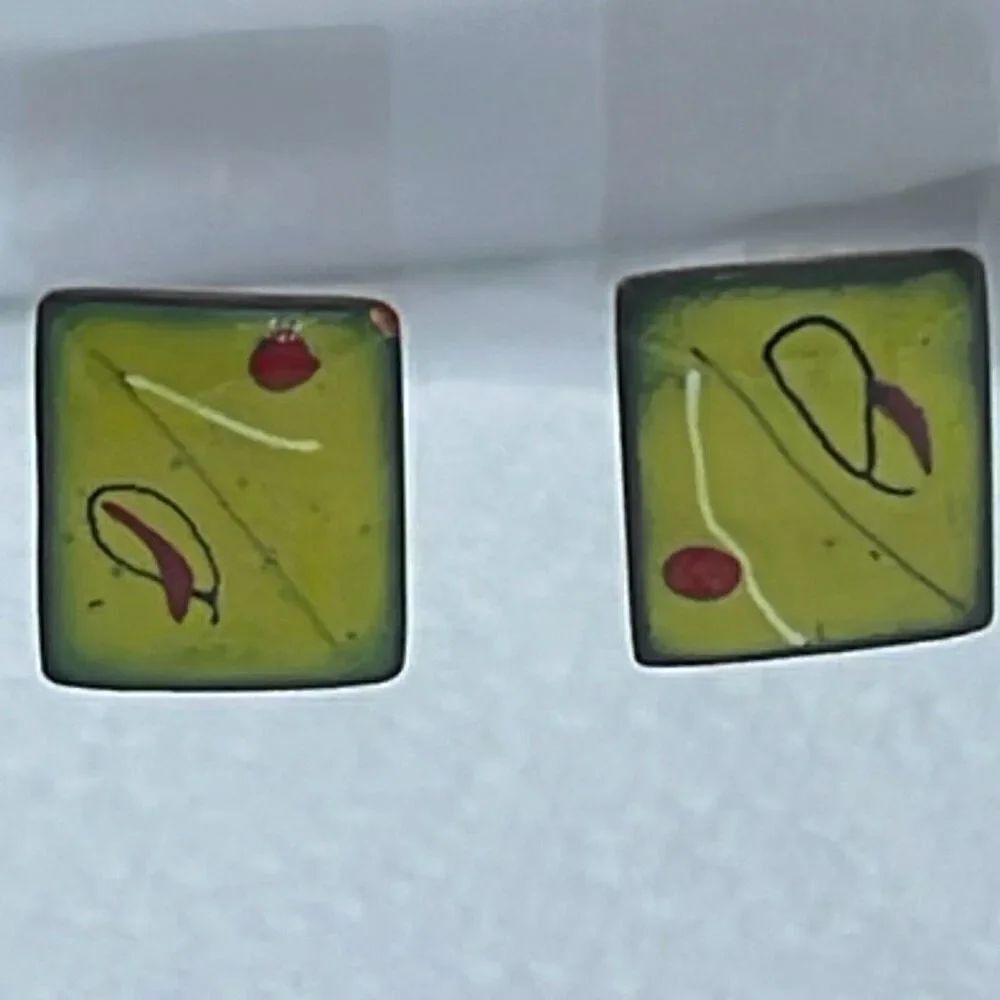 Artisan handmade enameled copper earrings signed.